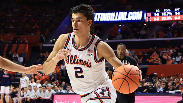 CHAMPAIGN, ILLINOIS - JANUARY 08: Andrej Stojakovic #2 of the Illinois Fighting Illini drives to the basket against Harun Zrno #13 of the Rutgers Scarlet Knights at State Farm Center on January 08, 2026 in Champaign, Illinois.