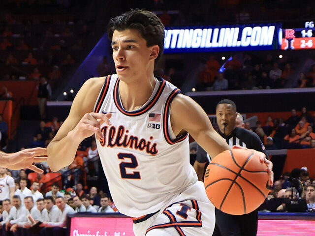 CHAMPAIGN, ILLINOIS - JANUARY 08: Andrej Stojakovic #2 of the Illinois Fighting Illini drives to the basket against Harun Zrno #13 of the Rutgers Scarlet Knights at State Farm Center on January 08, 2026 in Champaign, Illinois.