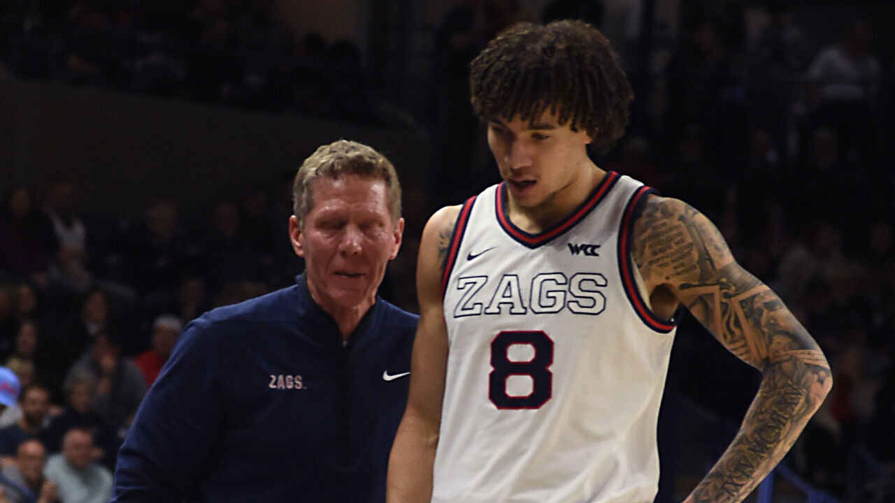 SPOKANE, WASHINGTON - JANUARY 21: Head coach Mark Few of the Gonzaga Bulldogs talks with Jalen Warley #8 as he comes off the floor during the second half against the Pepperdine Waves at McCarthey Athletic Center on January 21, 2026 in Spokane, Washington.