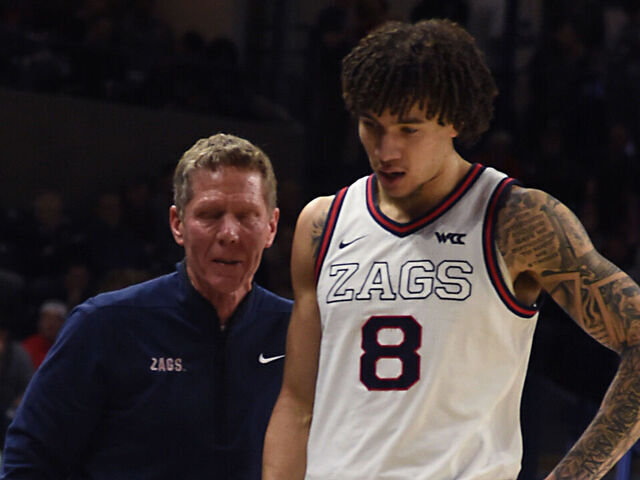 SPOKANE, WASHINGTON - JANUARY 21: Head coach Mark Few of the Gonzaga Bulldogs talks with Jalen Warley #8 as he comes off the floor during the second half against the Pepperdine Waves at McCarthey Athletic Center on January 21, 2026 in Spokane, Washington.