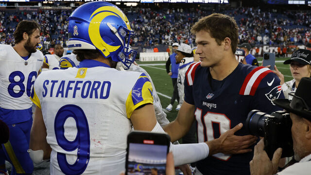 FOXBOROUGH, MA - NOVEMBER 17: New England Patriots quarterback Drake Maye (10) greets Los Angeles Rams quarterback Matthew Stafford (9) after a game between the New England Patriots and the Los Angeles Rams on November 17, 2024, at Gillette Stadium in Foxborough, Massachusetts.