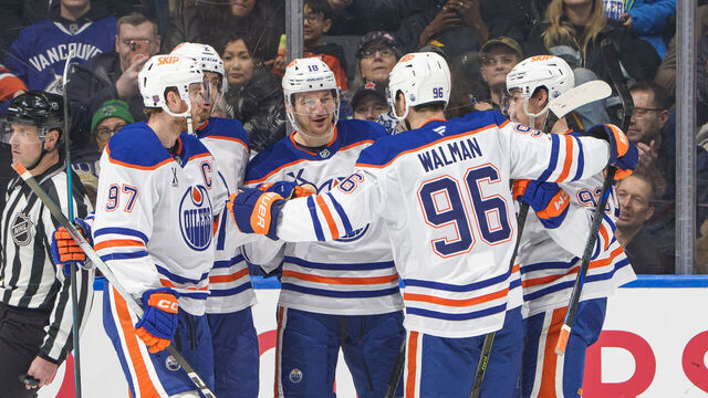 VANCOUVER, CANADA - JANUARY 17: Zach Hyman #18 of the Edmonton Oilers celebrates his goal with teammates during the second period of their NHL game against the Vancouver Canucks at Rogers Arena on January 17, 2026 in Vancouver, British Columbia, Canada.