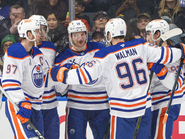 VANCOUVER, CANADA - JANUARY 17: Zach Hyman #18 of the Edmonton Oilers celebrates his goal with teammates during the second period of their NHL game against the Vancouver Canucks at Rogers Arena on January 17, 2026 in Vancouver, British Columbia, Canada.