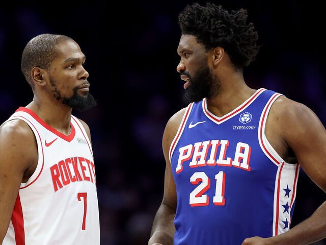 PHILADELPHIA, PENNSYLVANIA - JANUARY 22: Kevin Durant #7 of the Houston Rockets talks to Joel Embiid #21 of the Philadelphia 76ers during the first half at Xfinity Mobile Arena on January 22, 2026 in Philadelphia, Pennsylvania.