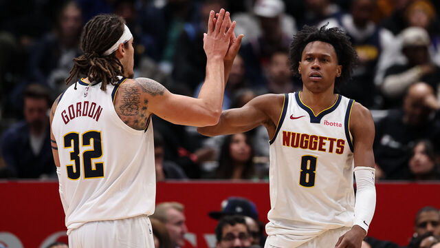 WASHINGTON, DC - JANUARY 22: Peyton Watson #8 of the Denver Nuggets celebrates with Aaron Gordon #32 after a play against the Washington Wizards during the second half at Capital One Arena on January 22, 2026 in Washington, DC.