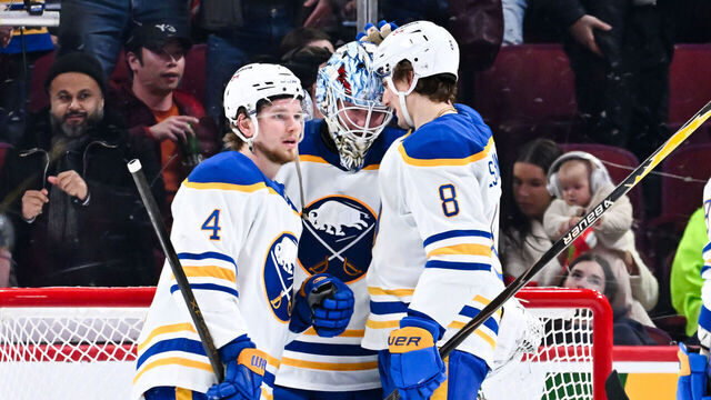 MONTREAL, CANADA - JANUARY 22: Bowen Byram #4, goaltender Ukko-Pekka Luukkonen #1 and Michael Kesselring #8 of the Buffalo Sabres celebrate a victory against the Montréal Canadiens at the Bell Centre on January 22, 2026 in Montreal, Quebec, Canada. The Buffalo Sabres defeated the Montréal Canadiens 4-2.