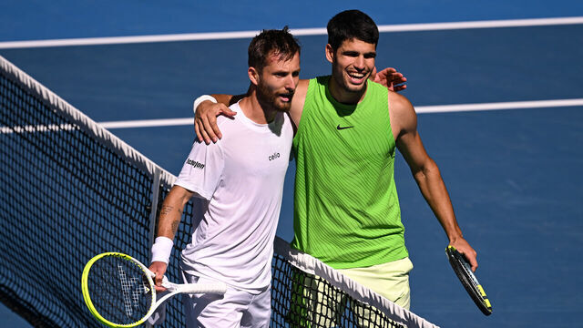 MELBOURNE, AUSTRALIA - JANUARY 23: Carlos Alcaraz of Spain and Corentin Moutet of France react after the Men's Singles third round match of the 2026 Australian Open at Melbourne Park on January 23, 2026 in Melbourne, Australia.