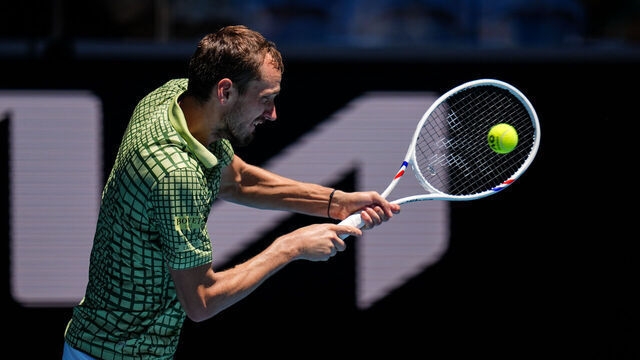 MELBOURNE, AUSTRALIA - JANUARY 23: Daniil Medvedev plays a backhand in the Men's Singles Third Round match against Fabian Marozsan of Hungary during day six of the 2026 Australian Open at Melbourne Park on January 23, 2026 in Melbourne, Australia.