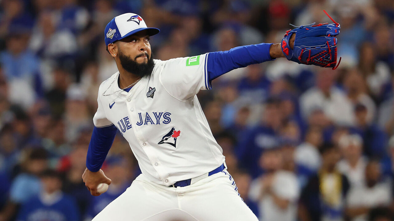 TORONTO, ONTARIO - NOVEMBER 01: Seranthony Domínguez #48 of the Toronto Blue Jays pitches during the tenth inning against the Los Angeles Dodgers in game seven of the 2025 World Series at Rogers Center on November 01, 2025 in Toronto, Ontario.