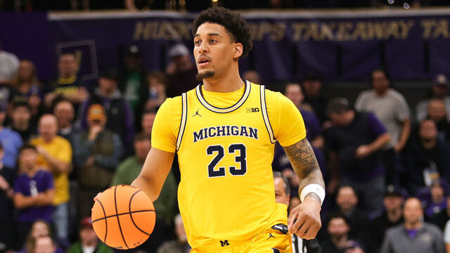 SEATTLE, WA - JANUARY 14: Forward Yaxel Lendeborg #23 of the Michigan Wolverines dribbles during a game between the Michigan Wolverines and Washington Huskies on January 14, 2026 at Alaska Airlines Arena in Seattle, Washington.