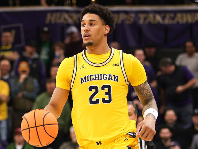 SEATTLE, WA - JANUARY 14: Forward Yaxel Lendeborg #23 of the Michigan Wolverines dribbles during a game between the Michigan Wolverines and Washington Huskies on January 14, 2026 at Alaska Airlines Arena in Seattle, Washington.