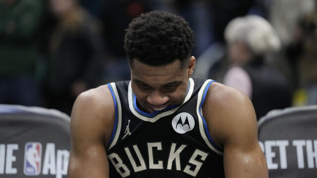 MILWAUKEE, WISCONSIN - JANUARY 23: Giannis Antetokounmpo #34 of the Milwaukee Bucks sustained an apparent injury on the bench during the fourth quarter against the Denver Nuggets at Fiserv Forum on January 23, 2026 in Milwaukee, Wisconsin.