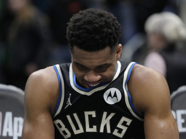 MILWAUKEE, WISCONSIN - JANUARY 23: Giannis Antetokounmpo #34 of the Milwaukee Bucks sustained an apparent injury on the bench during the fourth quarter against the Denver Nuggets at Fiserv Forum on January 23, 2026 in Milwaukee, Wisconsin.