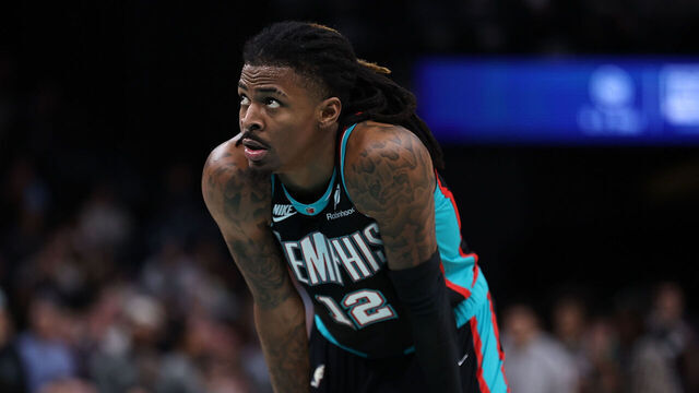 MEMPHIS, TENNESSEE - DECEMBER 30: Ja Morant #12 of the Memphis Grizzlies looks on during the game against the Philadelphia 76ers at FedExForum on December 30, 2025 in Memphis, Tennessee.
