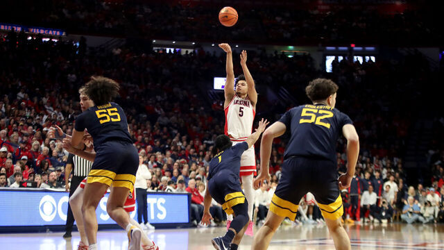 TUCSON, AZ - JANUARY 24: Arizona Wildcats guard Brayden Burries (5) shoots the ball during a men's basketball game between the West Virginia Mountaineers and the Arizona Wildcats on January 24, 2026, at McKale Center in Tucson, AZ.