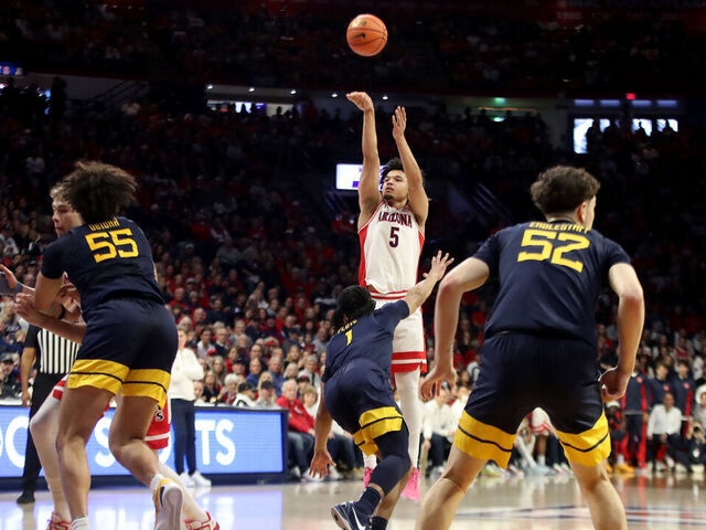 TUCSON, AZ - JANUARY 24: Arizona Wildcats guard Brayden Burries (5) shoots the ball during a men's basketball game between the West Virginia Mountaineers and the Arizona Wildcats on January 24, 2026, at McKale Center in Tucson, AZ.