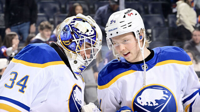 ELMONT, NEW YORK - JANUARY 24: Alex Lyon #34 celebrates the 5-0 shutout victory over the New York Islanders with Konsta Helenius #94 of the Buffalo Sabres at UBS Arena on January 24, 2026 in Elmont, New York.