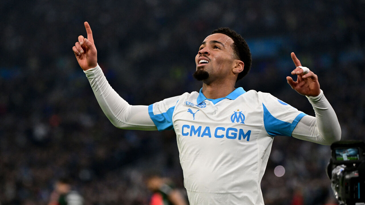Marseille's English midfielder #11 Ethan Nwaneri celebrates after scoring a goal during the French L1 football match between Olympique de Marseille (OM) and RC Lens at the Stade Velodrome in Marseille, southern France, on January 24, 2026.