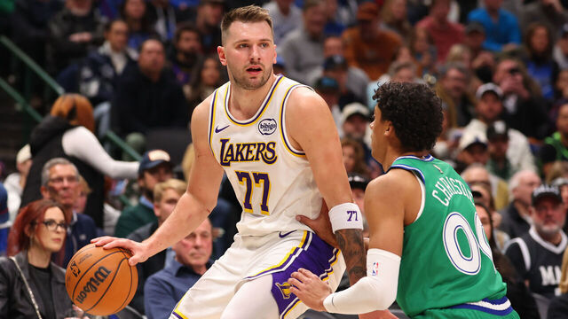DALLAS, TEXAS - JANUARY 24: Luka Doncic #77 of the Los Angeles Lakers drives against Max Christie #00 of the Dallas Mavericks during the first quarter at American Airlines Center on January 24, 2026 in Dallas, Texas.