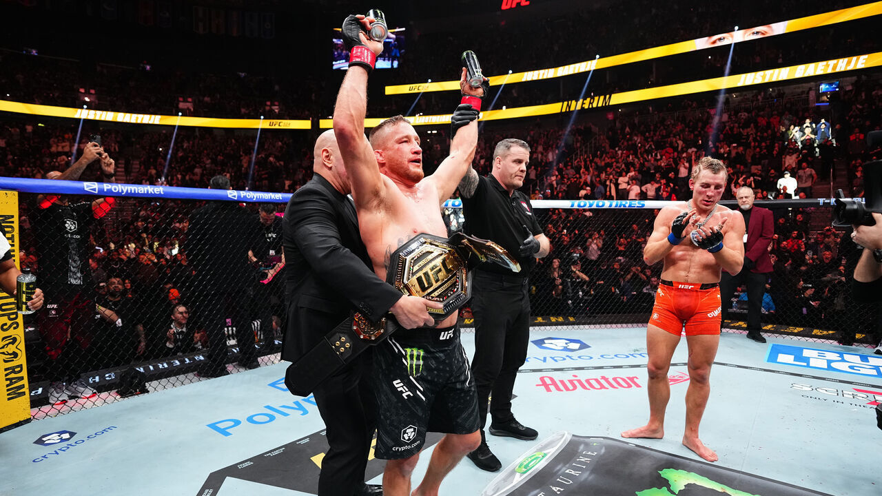 LAS VEGAS, NEVADA - JANUARY 24: Justin Gaethje has the belt strapped on his waist by UFC CEO and President Dana White following the UFC lightweight interim championship bout during the UFC 324 event at T-Mobile Arena on January 24, 2026 in Las Vegas, Nevada.