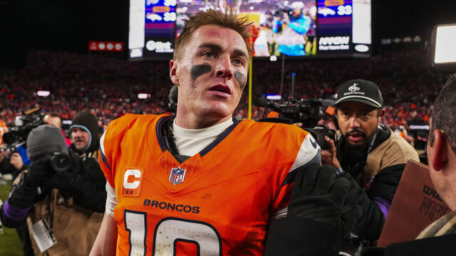 DENVER, COLORADO - JANUARY 17: Bo Nix #10 of the Denver Broncos celebrates after an NFL divisional playoff football game against the Buffalo Bills at Empower Field at Mile High on January 17, 2026 in Denver, Colorado.