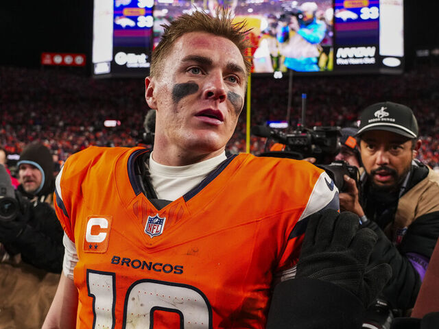 DENVER, COLORADO - JANUARY 17: Bo Nix #10 of the Denver Broncos celebrates after an NFL divisional playoff football game against the Buffalo Bills at Empower Field at Mile High on January 17, 2026 in Denver, Colorado.