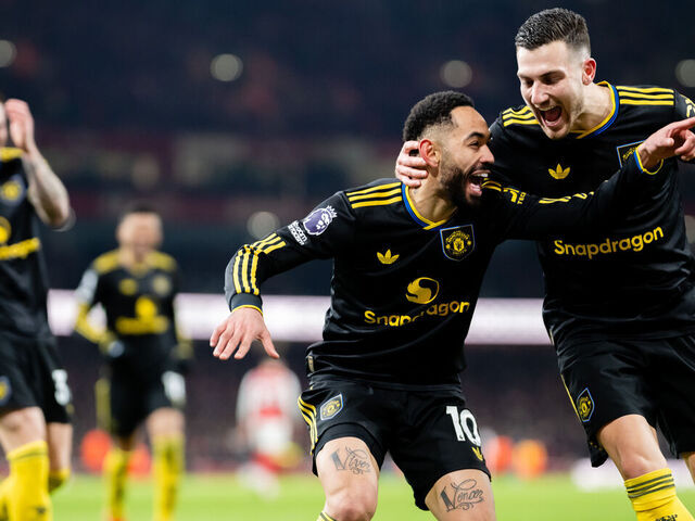 LONDON, ENGLAND - JANUARY 25: Matheus Cunha of Manchester United celebrates scoring a goal to make the score 2-3 during the Premier League match between Arsenal and Manchester United at Emirates Stadium on January 25, 2026 in London, United Kingdom.