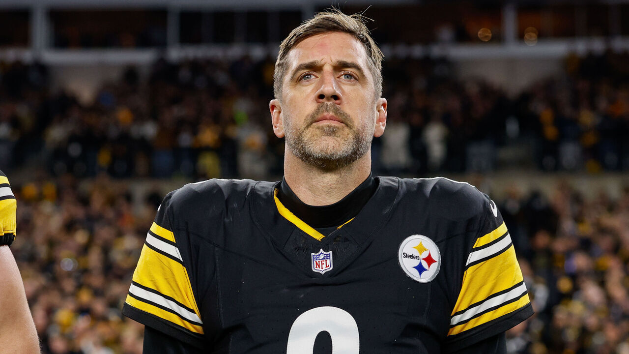 PITTSBURGH, PENNSYLVANIA - JANUARY 12: Aaron Rodgers #8 of the Pittsburgh Steelers stands for the national anthem prior to the AFC Wild Card playoff game against the Houston Texans at Acrisure Stadium on January 12, 2026 in Pittsburgh, Pennsylvania.