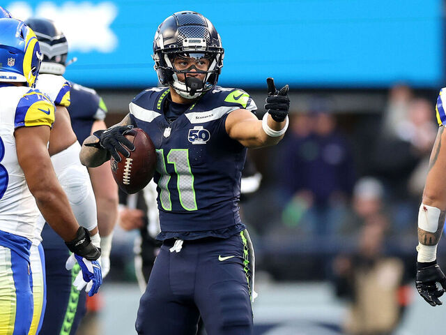 SEATTLE, WASHINGTON - JANUARY 25: Jaxon Smith-Njigba #11 of the Seattle Seahawks celebrates a first down during the second quarter against the Los Angeles Rams in the NFC Championship game at Lumen Field on January 25, 2026 in Seattle, Washington.