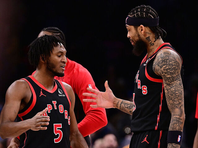 OKLAHOMA CITY, OKLAHOMA - JANUARY 25: Immanuel Quickley #5 and Brandon Ingram #3 of the Toronto Raptors celebrate during the second half against the Oklahoma City Thunder at Paycom Center on January 25, 2026 in Oklahoma City, Oklahoma.