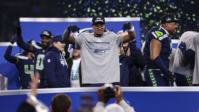 SEATTLE, WASHINGTON - JANUARY 25: Jaxon Smith-Njigba #11 of the Seattle Seahawks celebrates on stage after the NFC Championship NFL football game against the Los Angeles Rams, Sunday, Jan. 25, 2026, in Seattle. The Seattle Seahawks won 31-27 against the Los Angeles Rams.