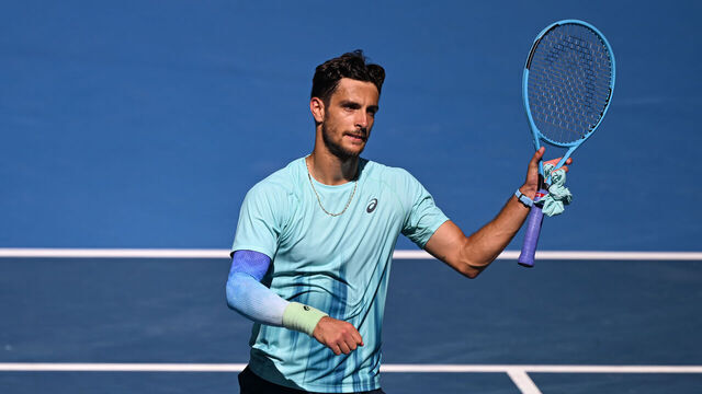 MELBOURNE, AUSTRALIA - JANUARY 26: Lorenzo Musetti of Italy celebrates winning match point against Taylor Fritz of the United States during the Men's Singles fourth round match on day nine of the 2026 Australian Open at Melbourne Park on January 26, 2026 in Melbourne, Australia.
