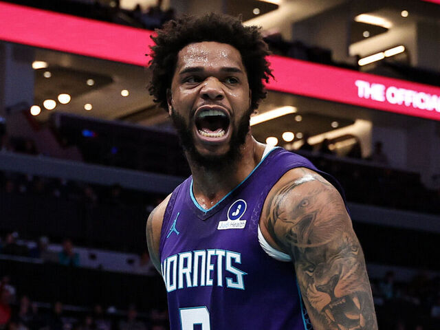 CHARLOTTE, NORTH CAROLINA - JANUARY 26: Miles Bridges #0 of the Charlotte Hornets reacts after dunking the ball during the first half of a basketball game against the Philadelphia 76ers at Spectrum Center on January 26, 2026 in Charlotte, North Carolina.