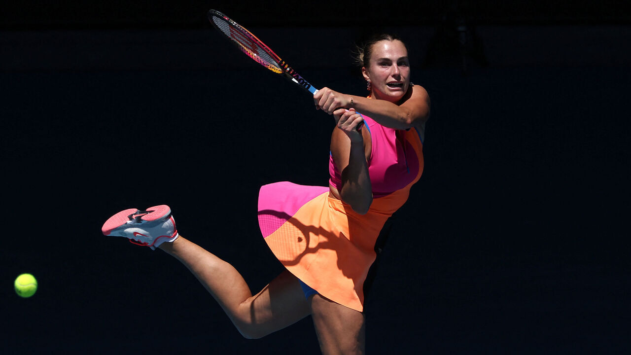Belarus' Aryna Sabalenka hits a return to USA's Iva Jovic during their women's singles quarter-final match on day ten of the Australian Open tennis tournament in Melbourne on January 27, 2026. / -- IMAGE RESTRICTED TO EDITORIAL USE - STRICTLY NO COMMERCIAL USE --