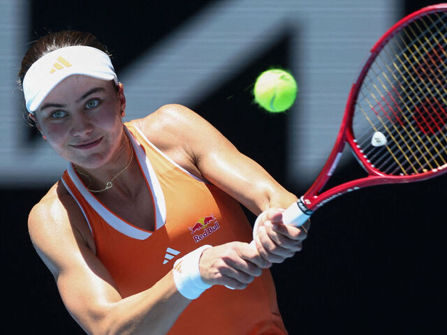 USA's Iva Jovic hits a return to Belarus' Aryna Sabalenka during their women's singles quarter-final match on day ten of the Australian Open tennis tournament in Melbourne on January 27, 2026. / -- IMAGE RESTRICTED TO EDITORIAL USE - STRICTLY NO COMMERCIAL USE --