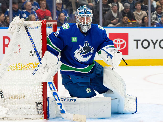 VANCOUVER, CANADA - DECEMBER 30: Thatcher Demko #35 of the Vancouver Canucks crouches in the crease during the second period of their NHL game against the Philadelphia Flyers at Rogers Arena on December 30, 2025 in Vancouver, Canada.