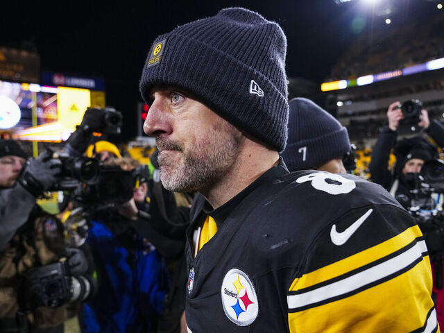 PITTSBURGH, PENNSYLVANIA - JANUARY 12: Aaron Rodgers #8 of the Pittsburgh Steelers looks on from the field after an NFL wild card playoff football game against the Houston Texans at Acrisure Stadium on January 12, 2026 in Pittsburgh, Pennsylvania.