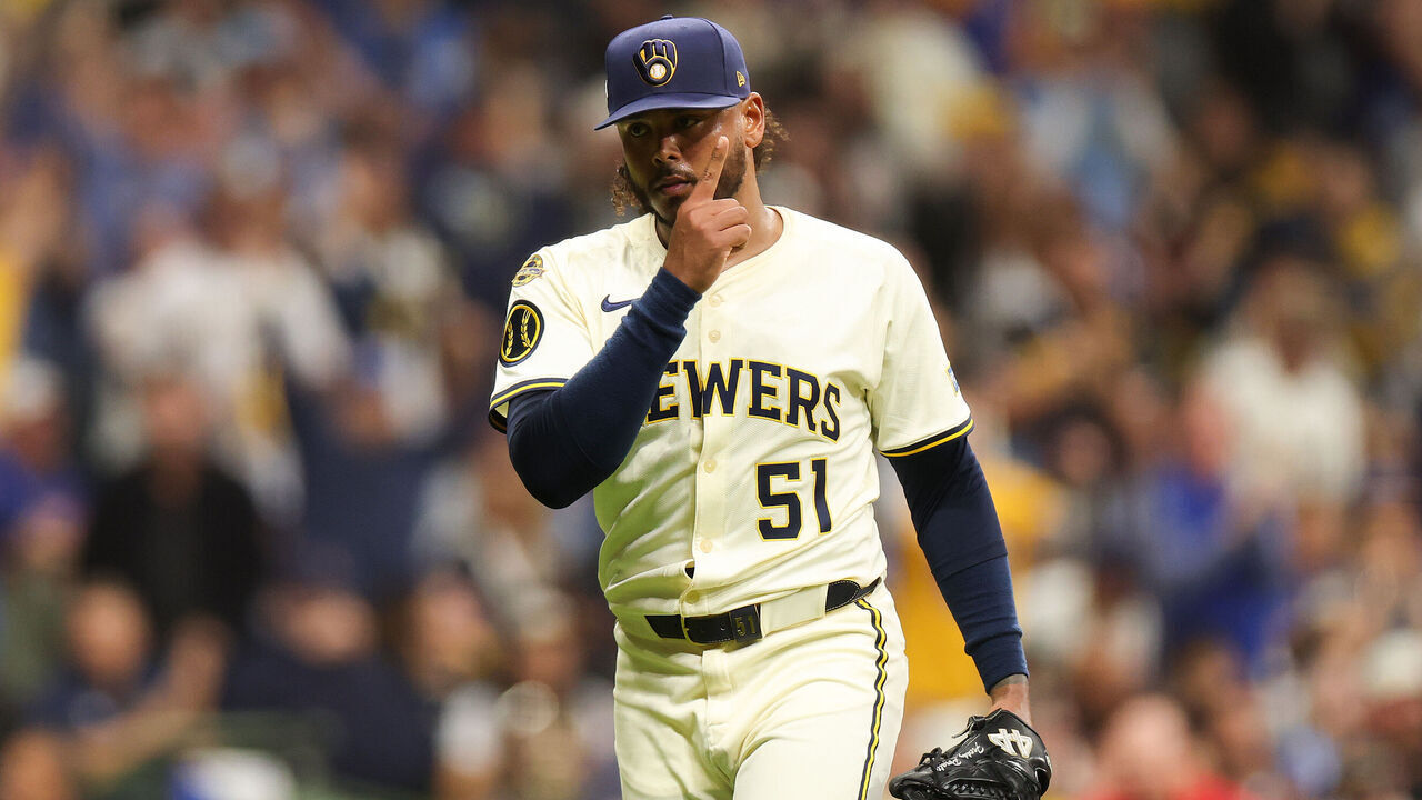 MILWAUKEE, WISCONSIN - OCTOBER 14: Freddy Peralta #51 of the Milwaukee Brewers celebrates during the fifth inning against the Los Angeles Dodgers in game two of the National League Championship Series at American Family Field on October 14, 2025 in Milwaukee, Wisconsin.