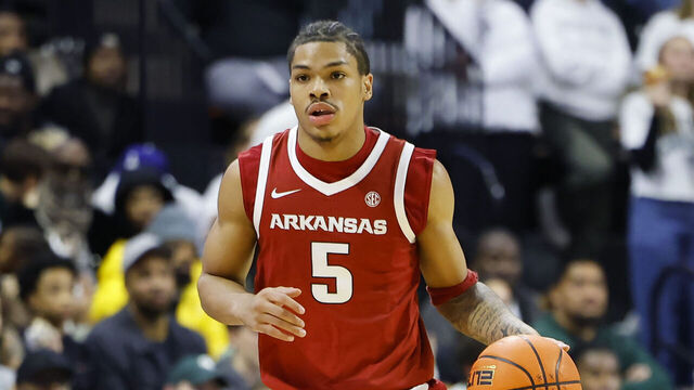 EAST LANSING, MICHIGAN - NOVEMBER 8: Darius Acuff Jr. #5 of the Arkansas Razorbacks dribbles the ball during the game the Michigan State Spartans at Breslin Center on November 8, 2025 in East Lansing, Michigan.