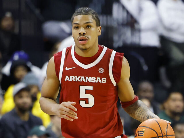 EAST LANSING, MICHIGAN - NOVEMBER 8: Darius Acuff Jr. #5 of the Arkansas Razorbacks dribbles the ball during the game the Michigan State Spartans at Breslin Center on November 8, 2025 in East Lansing, Michigan.