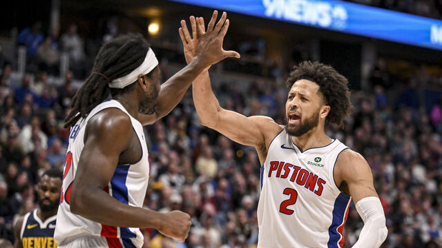 DENVER , CO - JANUARY 27: Cade Cunningham (2) of the Detroit Pistons high fives Isaiah Stewart (28) after Stewart made a shot, while drawing a foul from Jonas Valanciunas (17) of the Denver Nuggets during the fourth quarter of the Pistons' 109-107 at Ball Arena in Denver, Colorado on Tuesday, January 27, 2026.