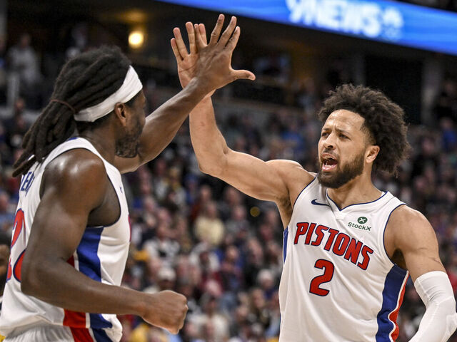 DENVER , CO - JANUARY 27: Cade Cunningham (2) of the Detroit Pistons high fives Isaiah Stewart (28) after Stewart made a shot, while drawing a foul from Jonas Valanciunas (17) of the Denver Nuggets during the fourth quarter of the Pistons' 109-107 at Ball Arena in Denver, Colorado on Tuesday, January 27, 2026.