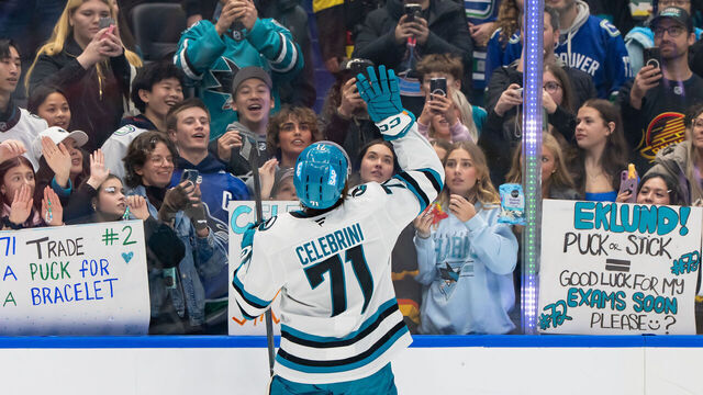 VANCOUVER, CANADA - JANUARY 27: Macklin Celebrini #71 of the San Jose Sharks receives a mini stick from fans during warmup prior to their NHL game against the Vancouver Canucks at Rogers Arena on January 27, 2026 in Vancouver, Canada.
