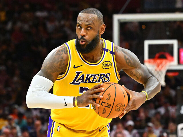 CLEVELAND, OHIO - OCTOBER 30: LeBron James #23 of the Los Angeles Lakers passes during the fourth quarter against the Cleveland Cavaliers at Rocket Mortgage Fieldhouse on October 30, 2024 in Cleveland, Ohio. The Cavaliers defeated the Lakers 134-110.