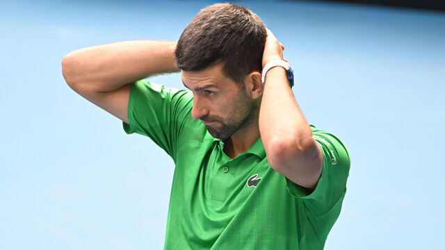 MELBOURNE, AUSTRALIA - JANUARY 28: Novak Djokovic of Serbia reacts during his on-court post match interview after winning in the Men's Singles Quarter Finals match against Lorenzo Musetti of Italy during day eleven of the 2026 Australian Open at Melbourne Park on January 28, 2026 in Melbourne, Australia.