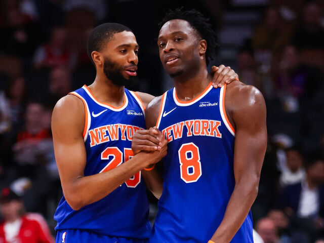TORONTO, CANADA - JANUARY 28: Mikal Bridges #25 and OG Anunoby #8 of the New York Knicks celebrate during the second half of their NBA game against the Toronto Raptors at Scotiabank Arena on January 28, 2026 in Toronto, Ontario, Canada. (NOTE TO USER: User expressly acknowledges and agrees that, by downloading and/or using this Photograph, user is consenting to the terms and conditions of the Getty Images License Agreement