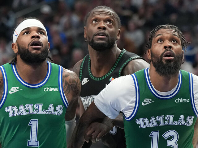 DALLAS, TX - JANUARY 28: Jaden Hardy #1 and Naji Marshall #13 of the Dallas Mavericks play defense against Julius Randle #30 of the Minnesota Timberwolves during the game on January 28, 2026 at American Airlines Center in Dallas, Texas. Mandatory Copyright Notice: Copyright 2026 NBAE