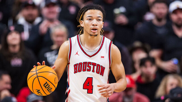 LUBBOCK, TEXAS - JANUARY 24: Kingston Flemings #4 of the Houston Cougars handles the ball during the second half of the game against the Texas Tech Red Raiders at United Supermarkets Arena on January 24, 2026 in Lubbock, Texas.