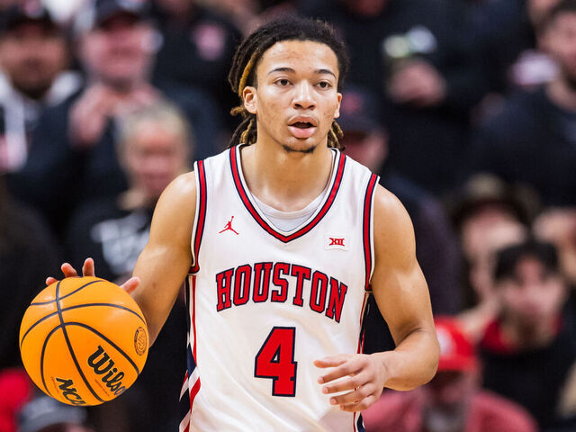 LUBBOCK, TEXAS - JANUARY 24: Kingston Flemings #4 of the Houston Cougars handles the ball during the second half of the game against the Texas Tech Red Raiders at United Supermarkets Arena on January 24, 2026 in Lubbock, Texas.