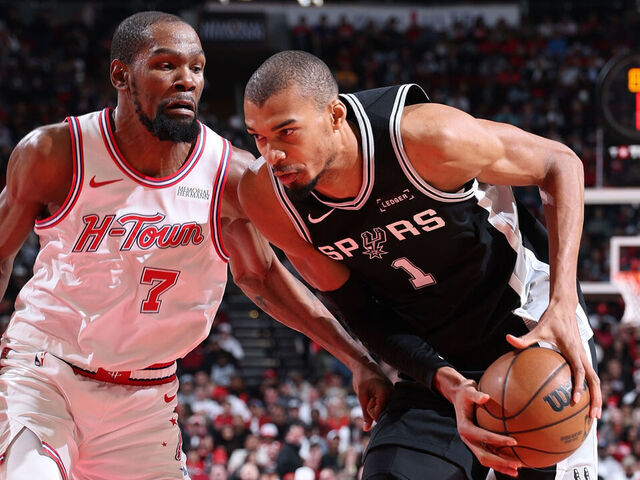 HOUSTON, TX - JANUARY 28: Victor Wembanyama #1 of the San Antonio Spurs drives to the basket as Kevin Durant #7 of the Houston Rockets plays defense during the game on January 28, 2026 at the Toyota Center in Houston, Texas. Mandatory Copyright Notice: Copyright 2026 NBAE